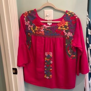 J Marie deep pink with multicolored embroidery and flutter sleeves.